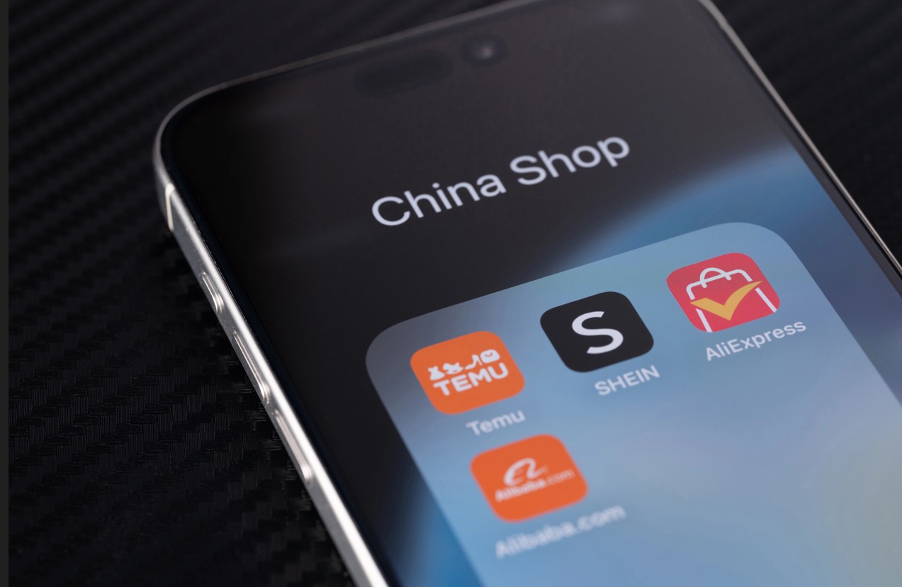 App Icons von Temu Shein und AliExpress auf einem Smartphone
